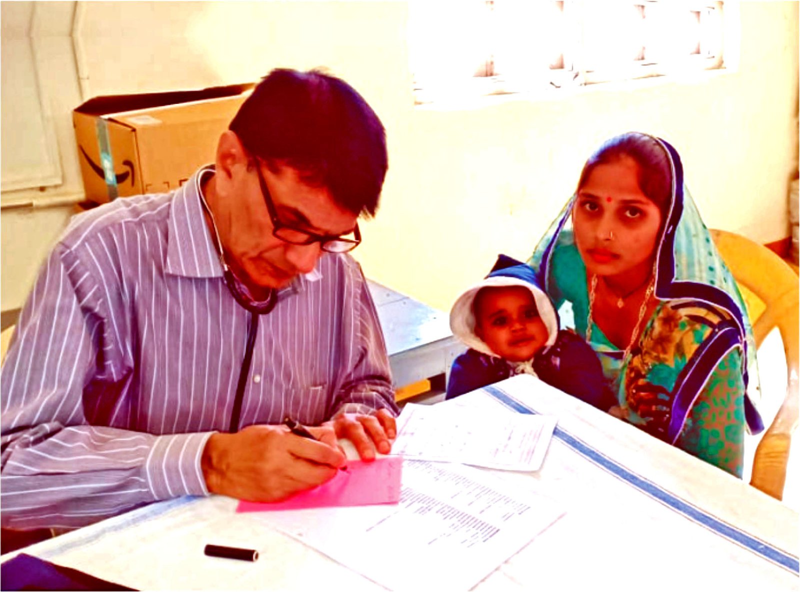 Free pharmacy setup and medicine distribution desk in Virampur.